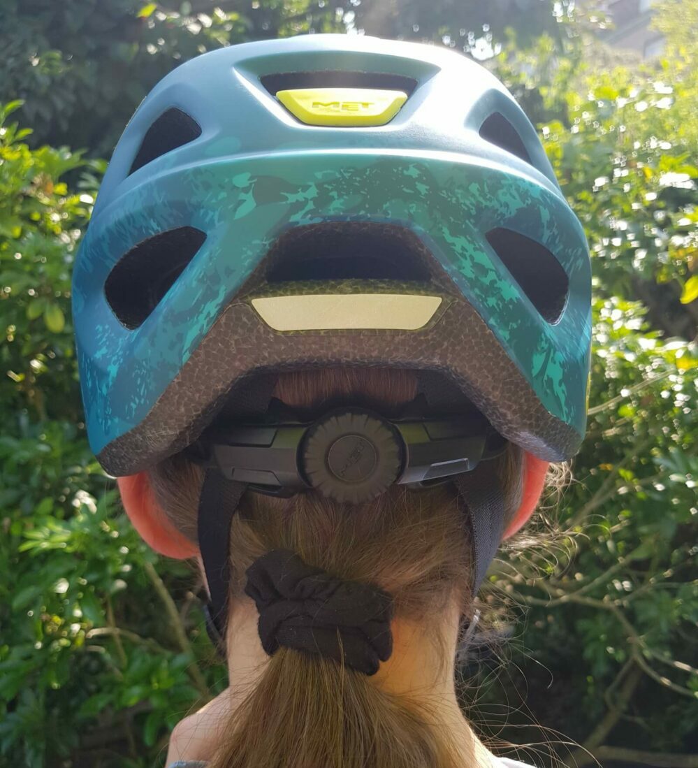 MET helmet ponytail kids MET Eldar bike helmet girl with ponytail