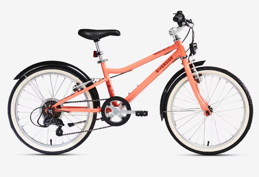 Best 20" kids' bikes: The Btwin 20 Riverside 500 in coral on a blank background