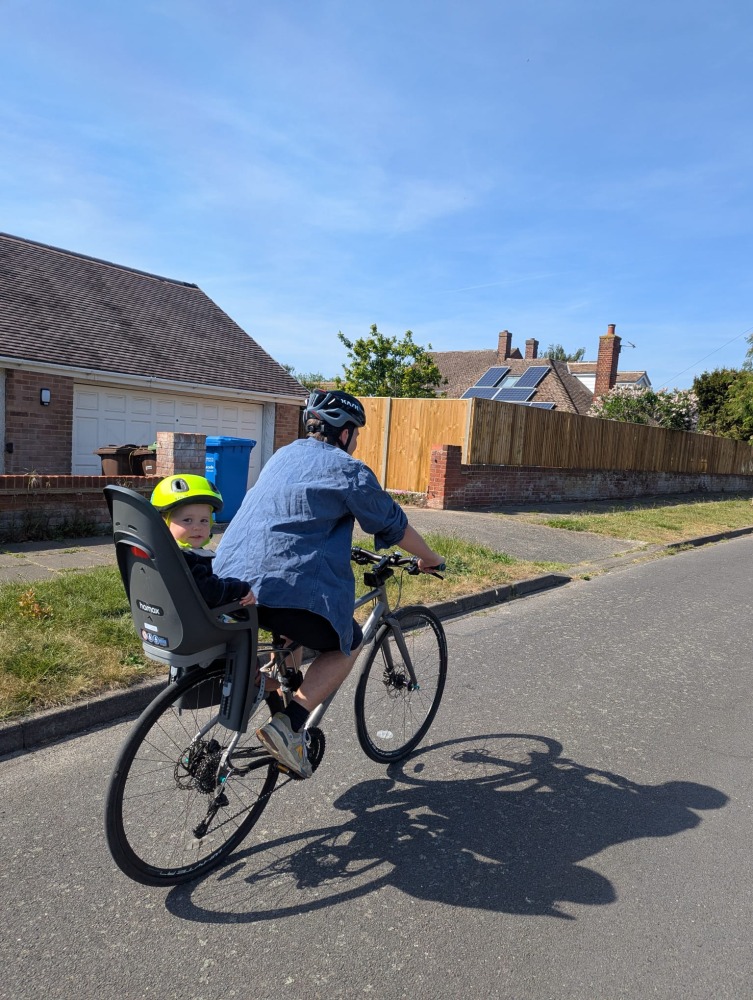 a dad riding his baby tonursery