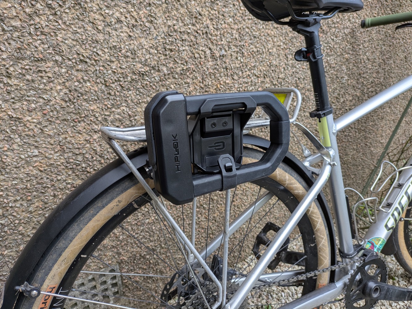 A black hiplok D1000 locking a silver bike