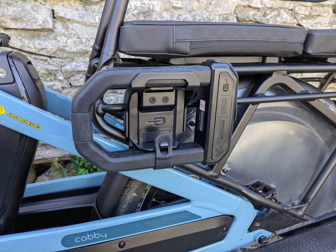 A black hiplok D1000 mounted on a blue, Gazelle Cabby longtail cargo bike