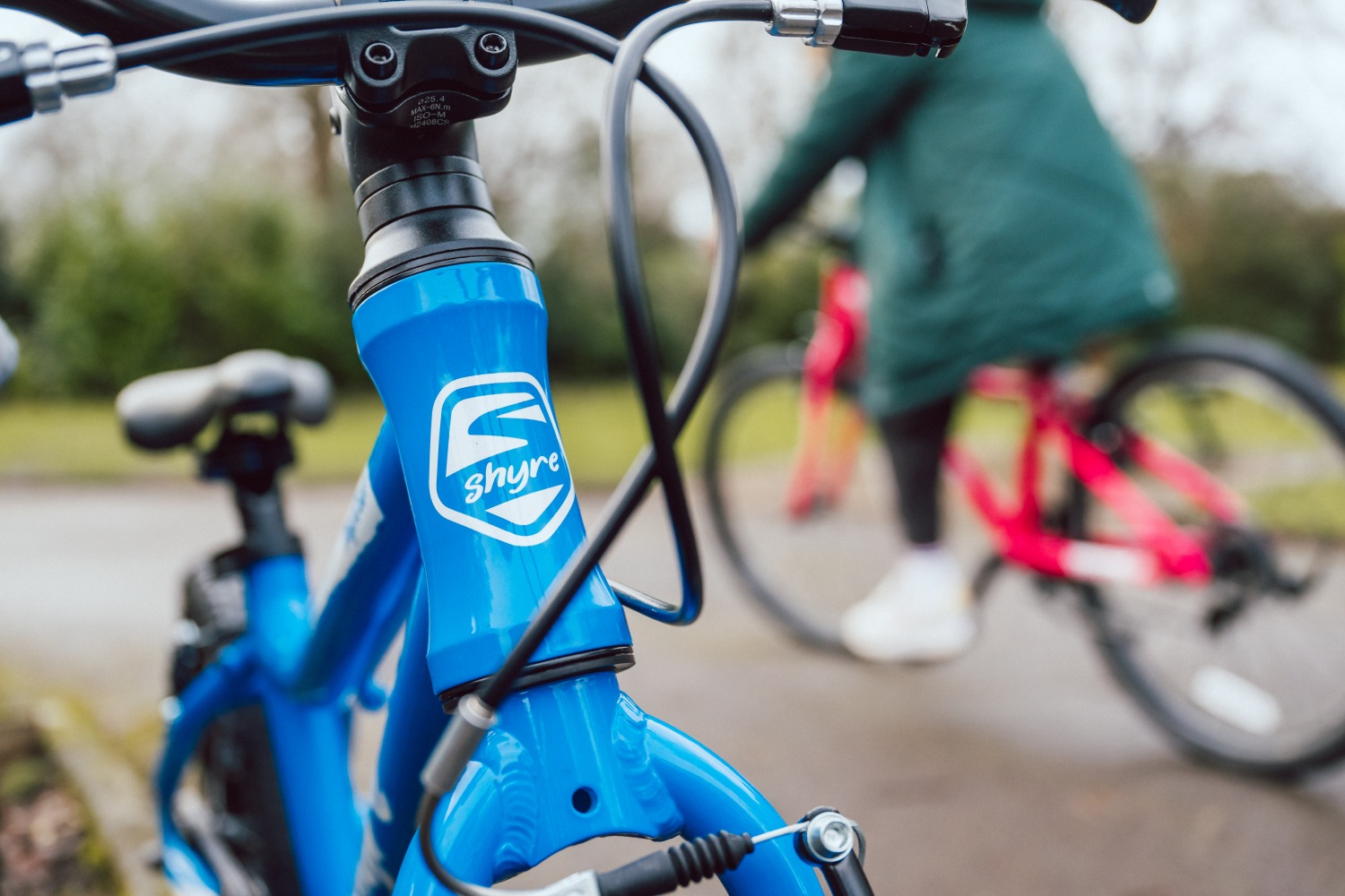 A close up of the Shyre bikes head badge
