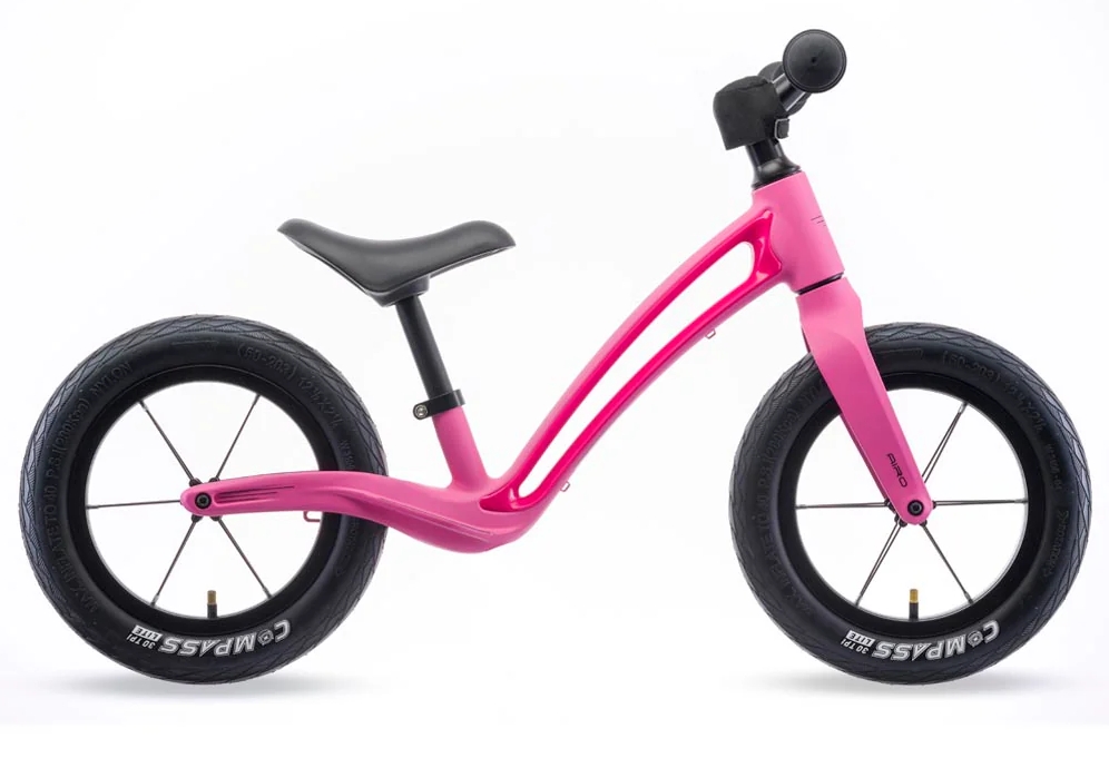 bikes for girls: the hornit airo 12 in pink on a blank background