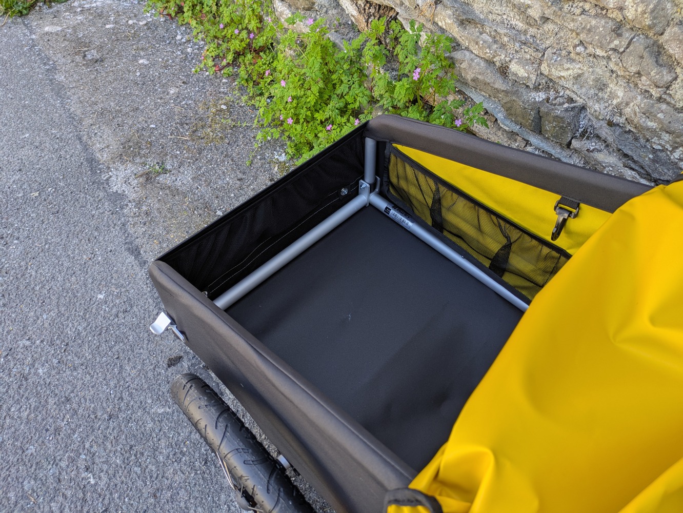 the yellow and black Burley Nomad cargo close up of the inside