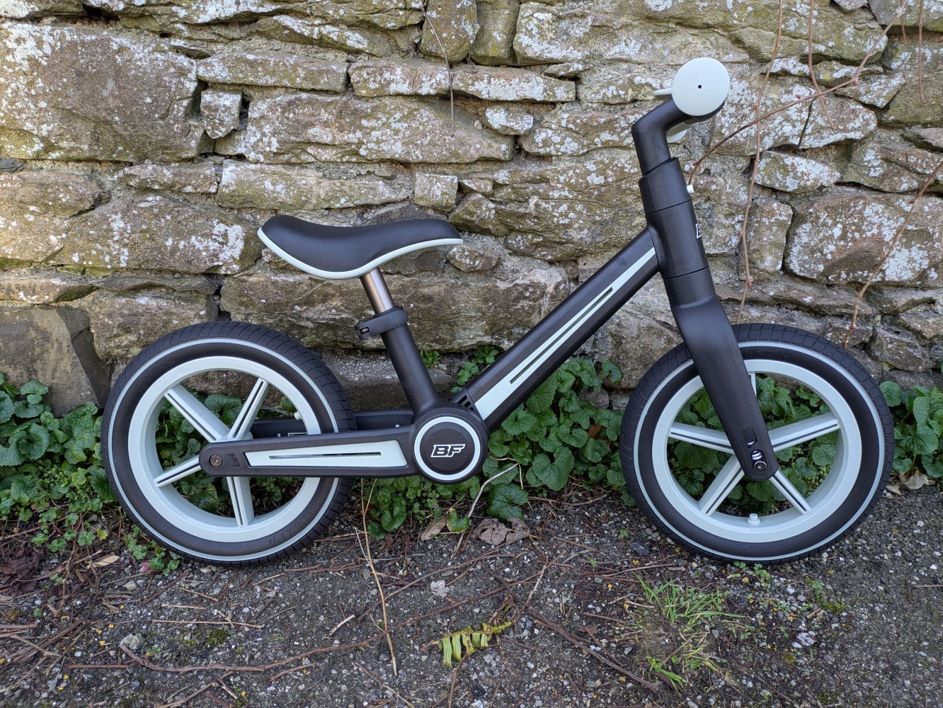 A blue and black Be Fun wheels folding balance bike,
