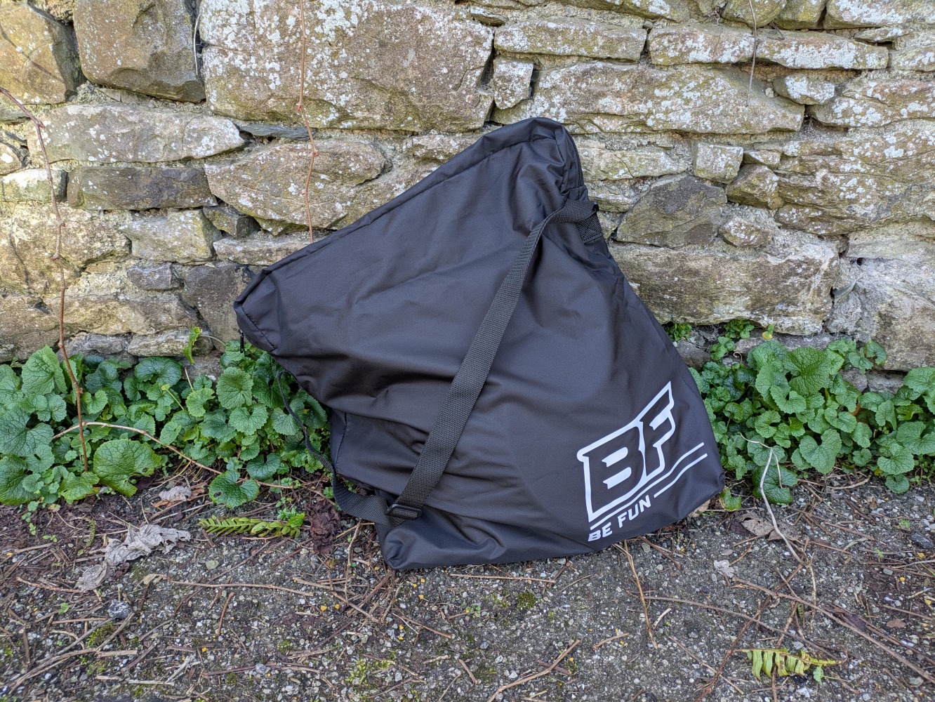 Be Fun wheels folding balance bike, folded in its case