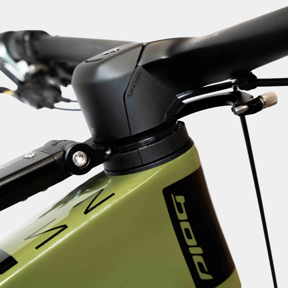 the new kids ride shotgun ICR adapter fitted to a green bike