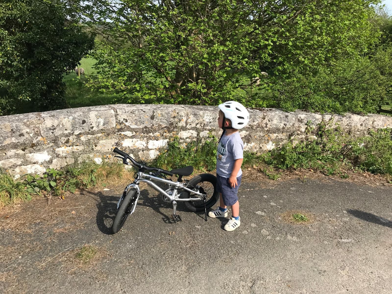 A little boy with his Early Rider Belter 14