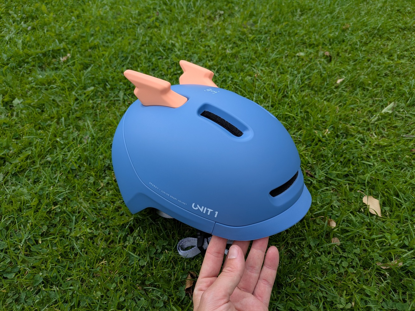 the blue SPARKY helmet with pink lightning bolt inserts